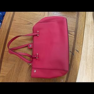 Second hand hot pink coach bag, great condition.